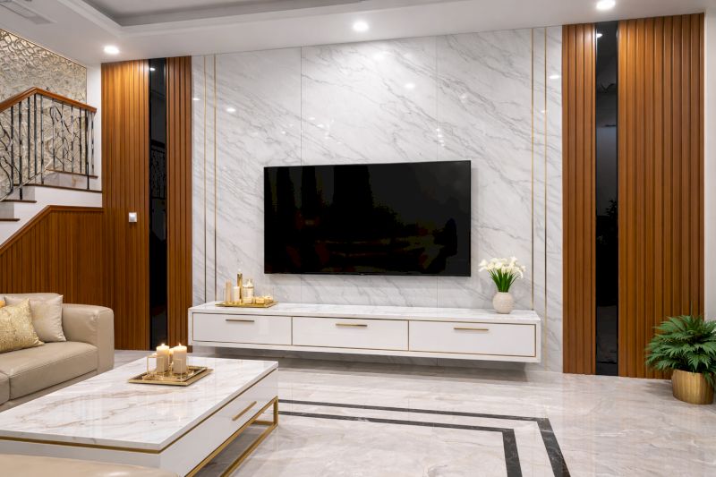 Tổng hợp 40 mẫu ốp nhựa giả đá phòng khách bền đẹp, giá ưu đãi 26 Tông màu trắng vân mây của tấm PVC vân đá tạo nên không gian phòng khách tinh tế và hiện đại.