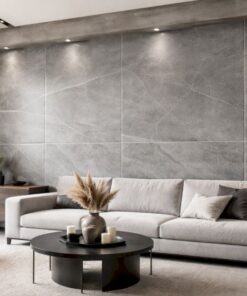 Tông xám trung tính của tấm PVC vân đá phù hợp với những gia chủ yêu thích sự đơn giản và cá tính.